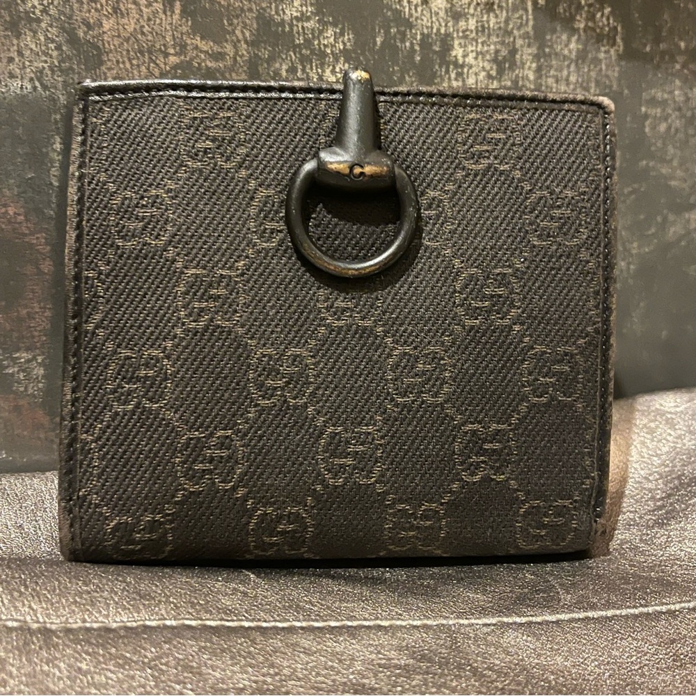 Lost in the 🔥 Gucci Dark Brown Monogram Wallet
